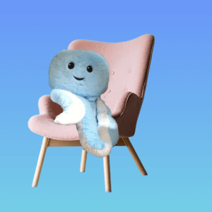 A picture of a stuffed blue octopus toy sitting in a chair. 